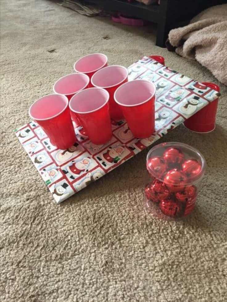 christmas-cup-toss-christmas-sweater-party-games