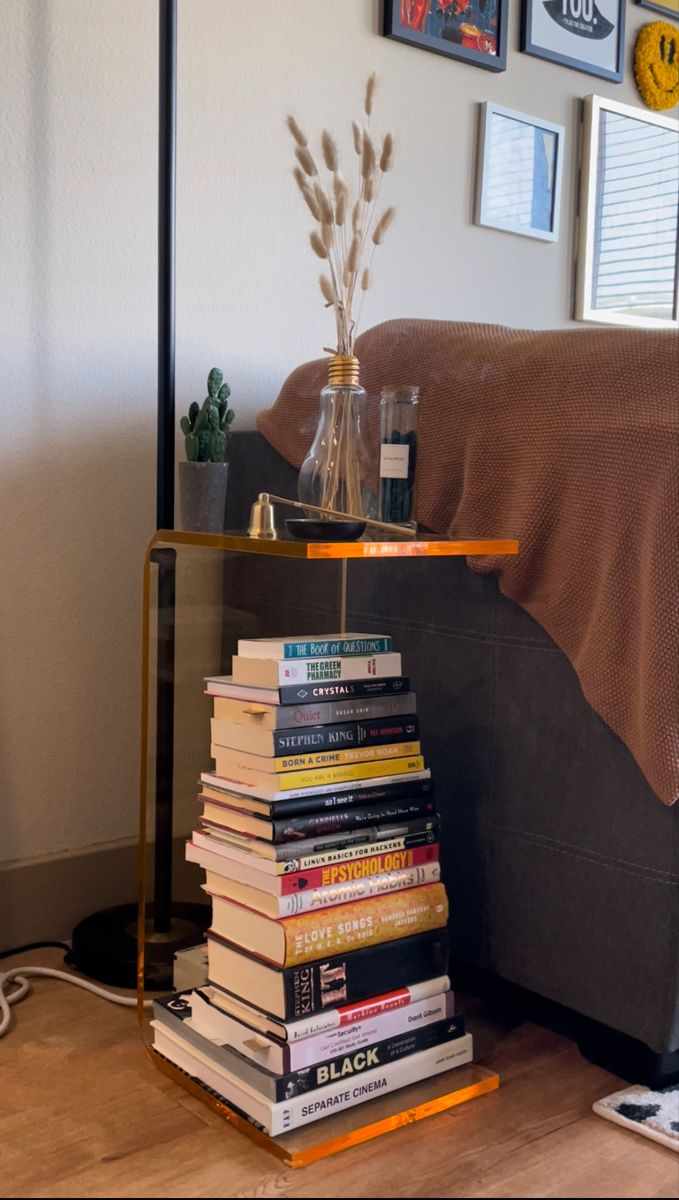 stack-of-books-with-glass-or-acrylic-on-top