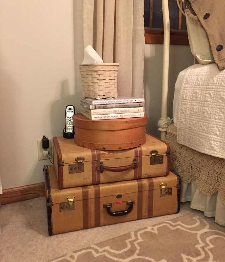 stack-of-vintage-suitcases-or-crates-bedside-table-ideas-for-small-spaces