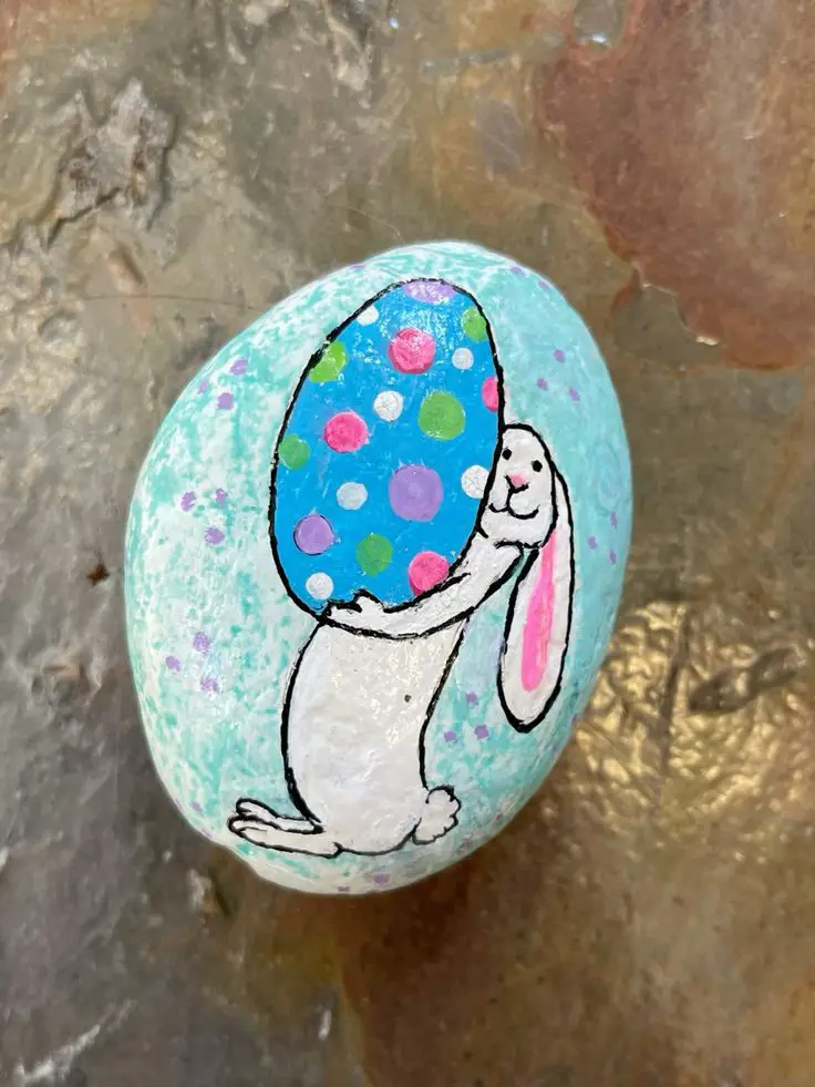 bunny-holding-an-egg-rock