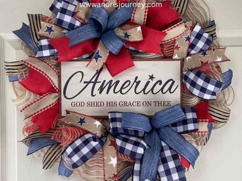 An-American-wreath-hanging-at-the-door-as-35-Stunning-4th-of-July-Wreaths-to-Welcome-Guests-in-Style