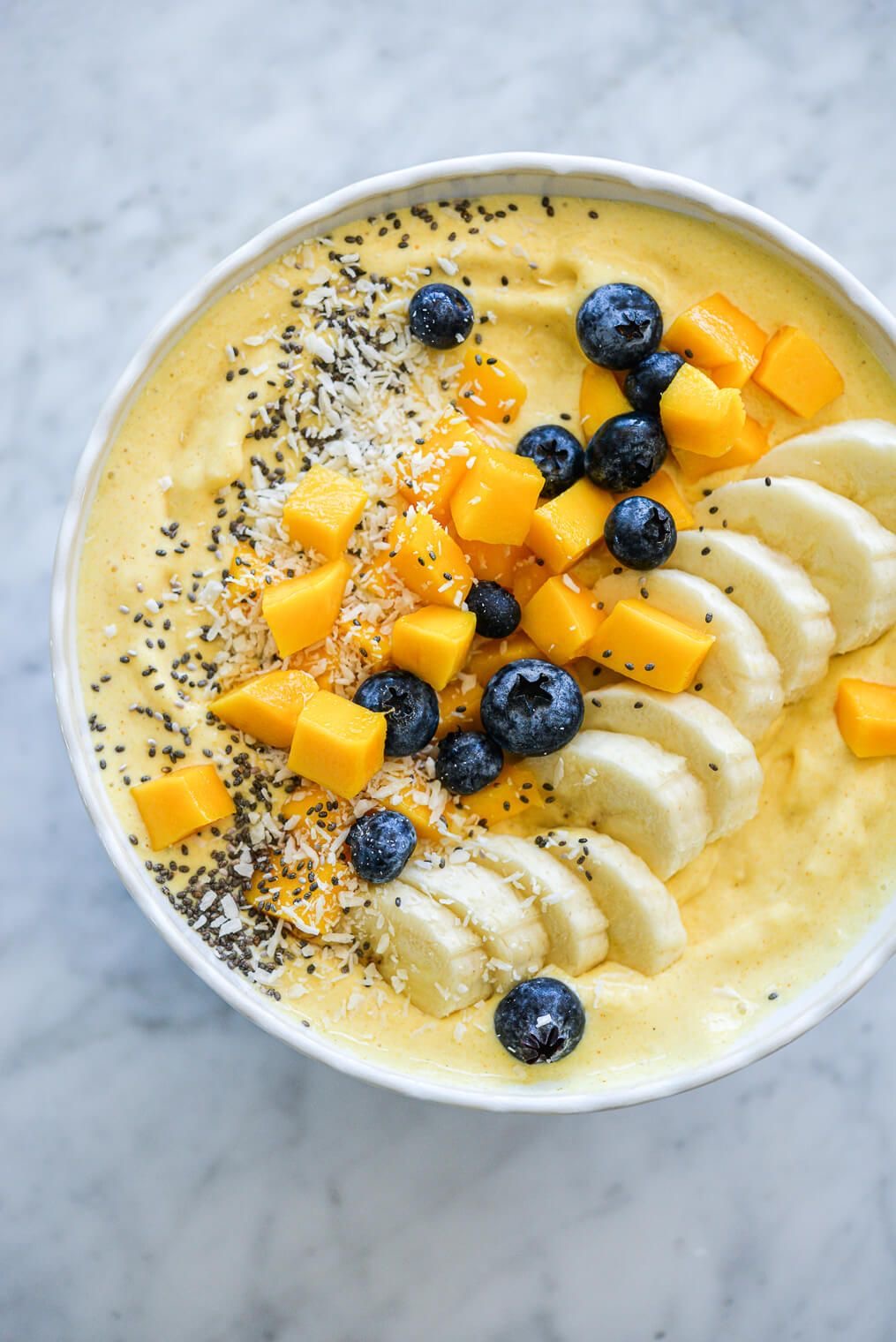 Mango-Smoothie-Bowls-as-31-Gorgeous-Mothers-Day-Brunch-Ideas-That-Will-Impress-Mom