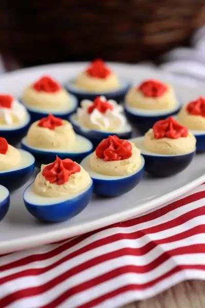 Red-White-and-Blue-Deviled-Eggs-as-21-Irresistible-4th-of-July-Appetizers-That-Will-Wow-Your-Guests