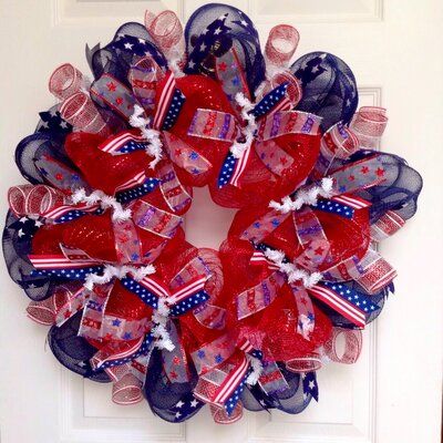 Ribbon-Swirl-Wreath-as-35-Stunning-4th-of-July-Wreaths-to-Welcome-Guests-in-Style