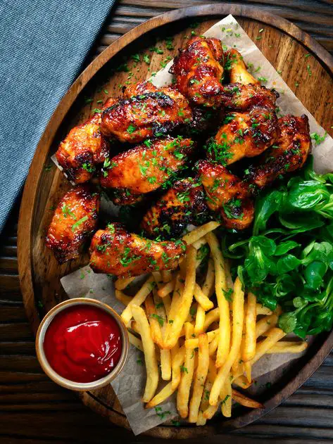 BBQ-Chicken-Wings-with-a-Honey-Sriracha-Glaze-as-23-Best-Backyard-BBQ-Recipes-for-the-Ultimate-4th-of-July-Cookout