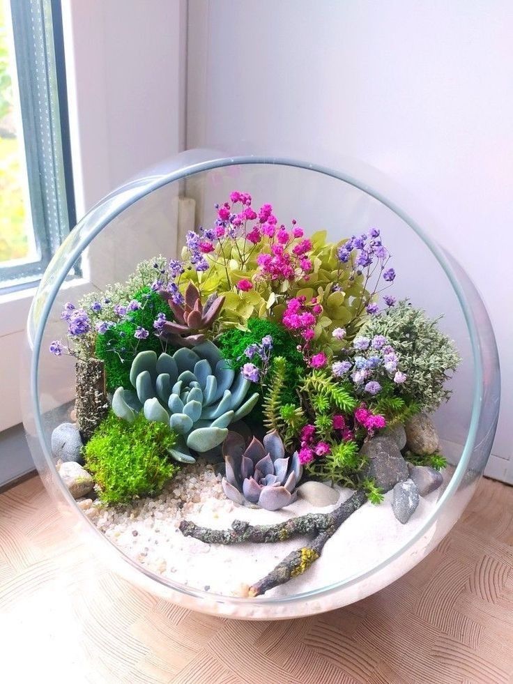 Mini-Garden-in-a-Glass-Terrarium.-as-39-Stunning-Mothers-Day-Centerpieces-That-Will-Elevate-Any-Table