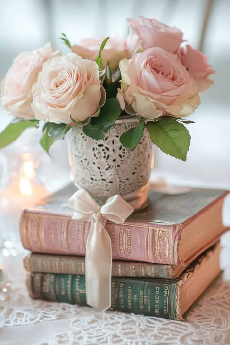 Vintage-Bookstack-with-Flowers-as-39-Stunning-Mothers-Day-Centerpieces-That-Will-Elevate-Any-Table