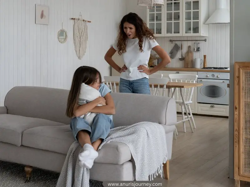 Mother-angrily-talking-to-a-toddler