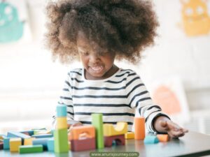 toddler-playing-toys-Toddler-Sleep-Schedules-that-actually-works
