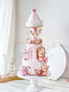 this is a Carousel Cake for a baby shower