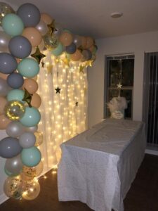 this is a Twinkle Lights backdrop for a baby shower decor