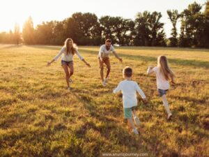 family-in-the-fields-playing-together-as-one-of-What-to-do-if-you-feel-like-you’re-failing-as-a -mom