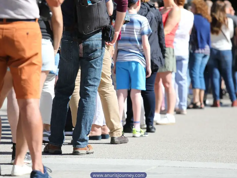 parents-and-kids-standing-on-a-queue-How-to-Teach-Kids-Manners-Without-Being-Too-Strict