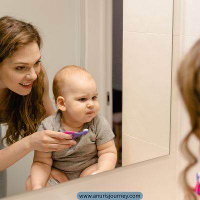 brushing-a-childs-teeth-in-front-of-a-mirror