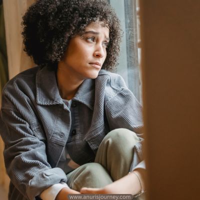 mum-thinking-by-the -window-How-to-Set-Boundaries-as-a-Mom-So-You-Don’t-Feel-Like-a-Doormat