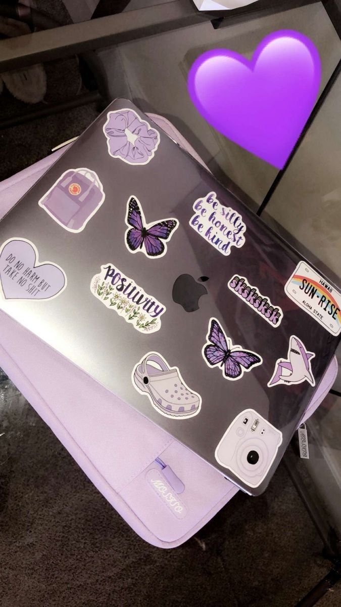 Laptop decorated with pastel vinyl stickers