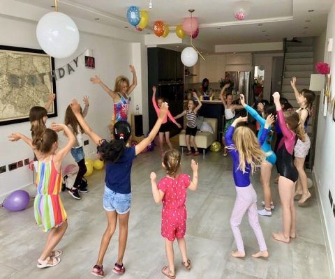children dancing in a party