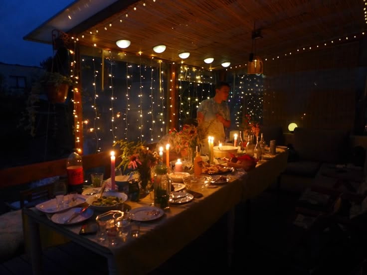 Dinner-Outside-With-String-LightsBirthday-Party-Themes-For-a-Small-Group-of-Adults