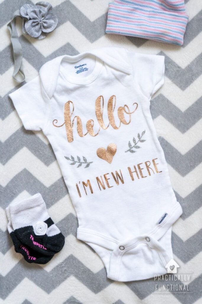 Baby-Bodysuit-With-a-Simple-Birth-Season-Design-cricut-projects-using-cricut-infusible-ink