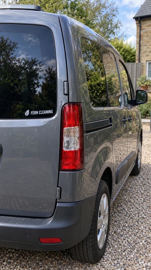 Grey-cleaning-van-with-leaf-decal